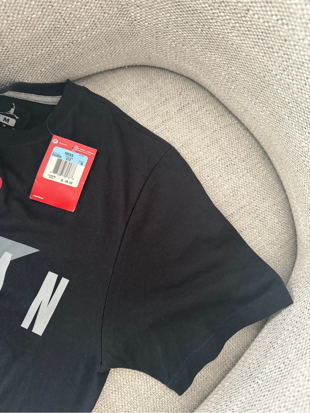 Jordan Black Short Sleeve Tee with Red Jumpman and Gray Graphic